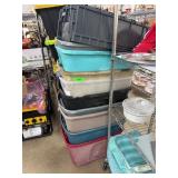 Stack of Assorted Plastic Storage Totes