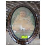 Framed Oval Photograph of Baby With Wooden Frame