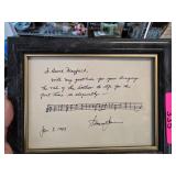 Framed Signed Note with Musical Notation