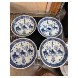 Four Blue and White Ceramic Plates
