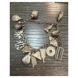 Taiwan Silver Charm Bracelet with Multiple Charms