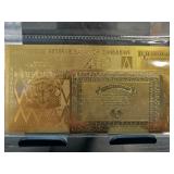 Gold-Colored Zimbabwe 100 Trillion Dollar Note