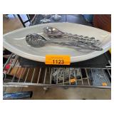 White platter Âwith utensils