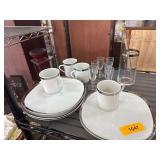 White Dinnerware and Glassware Set with Silver Det