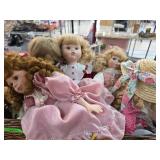 Porcelain Dolls in Basket