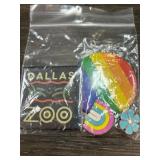 Four Assorted Pins and Button