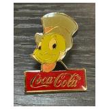 Coca-Cola Pin Featuring Cartoon Figure