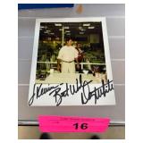 Signed Polaroid Photograph in Indoor Setting