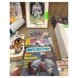 Sports Memorabilia Lot With Magazines and Artwork