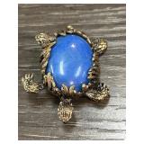 Turtle-Shaped Brooch with Blue Oval Stone