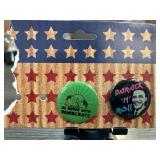 Two Political Pinback Buttons on Display Card