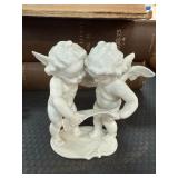 German Porcelain Cherub Figurine Pair
