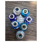 Seven Sterling Silver Glass Beads