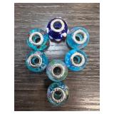 Seven Sterling Silver Glass Beads