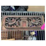 Hand-Carved Wooden Panel with Bird Motif