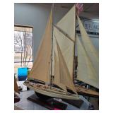Wooden Sailboat Model on Display Stand