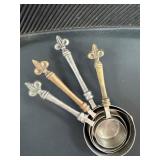 Four Fleur-de-Lis Measuring Cups