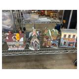 Four Ceramic Lighted Holiday Houses