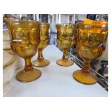 Four Amber-Colored Glass Goblets