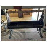 Metal Basket with Ornate Ends and Wooden Handle