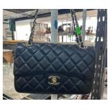 Chanel Black Quilted Chanel Handbag with Gold Hard