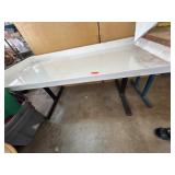 White Rectangular Table on Metal Legs