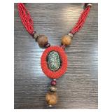 Multistrand Beaded Necklace With Pendant