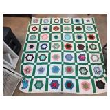 Handmade Patchwork Quilt with Floral Motif
