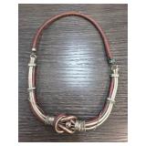 Leather and Metal Knot Necklace With Mixed Strands