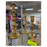 Four Polished Brass Candle Holders