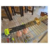 Decorative Short Sword with Black and Gold Details