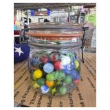 Glass Jar Filled with Colorful Marbles