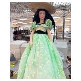 Porcelain Doll in Green Dress with Straw Hat