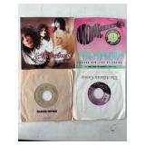Four 45 RPM Vinyl Records