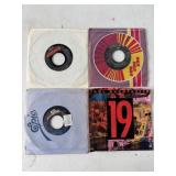 Four Vintage Vinyl 45 RPM Records
