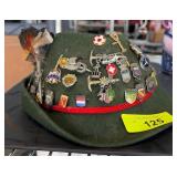 Green German-Style Hat with Badges and Feathers