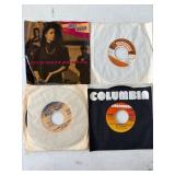 Four 45 RPM Vinyl Records