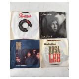 Four 1980s Vinyl Singles