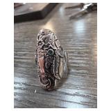 Decorative Metal Ring with Green Stone Accent
