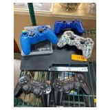 PlayStation 3 Console with Controllers and Game