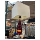 Red Glass Lamp With White Shade And Dual Outlets