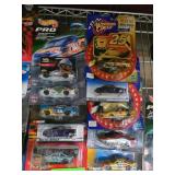 11 NASCAR Die-Cast Cars in Packaging