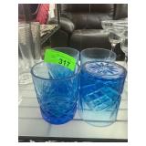 Four Blue Glass Tumblers with Patterned Design