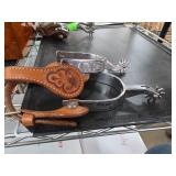 Engraved Metal Spurs With Tooled Leather Straps