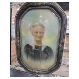 Framed Portrait of a Woman With Ornate Detailing