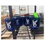 Four Blue Glass Vessels with Logo