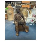 Bronze-Colored Seated Male Figure Sculpture