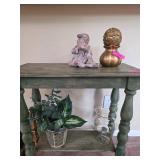 Decorative Table with Assorted Decor Pieces