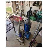 Two Upright Vacuum Cleaners with Accessories
