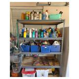 Metal Shelf With Various Household Contents